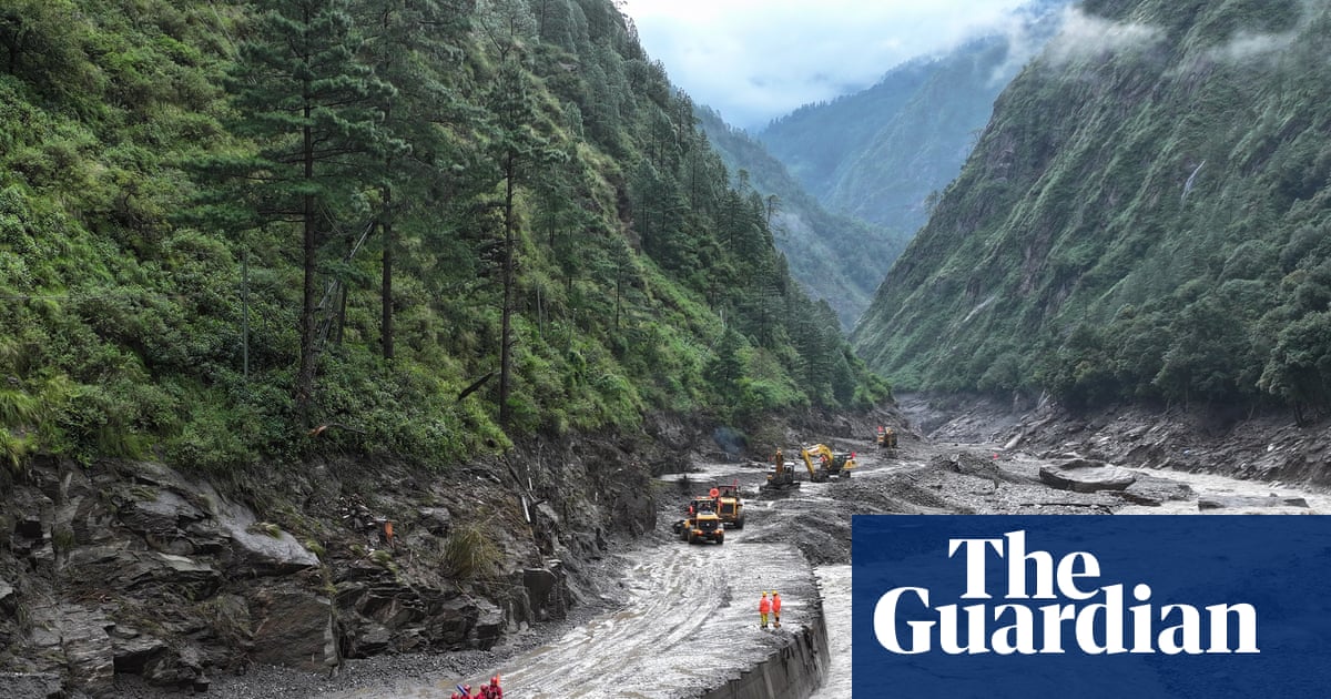 Overflowing lake halts rescue efforts as Nepal-Tibet flood death toll hits 474