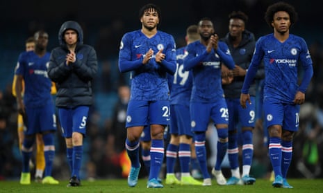 Reece James (centre) and Willian (right) look dejected as the Chelsea players applaud their fans.