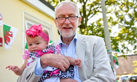 Jeremy Corbyn holding 9-month-old Narrah Godfrey-Collin during a visit to a kids’ lunch club in Swansea, Wales, this afternoon.