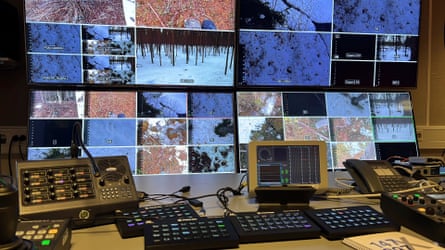 Control room with many screens