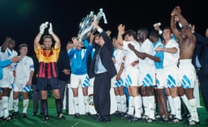 Raymond Goethals lifts the trophy after guiding Marseille to Champions League glory.