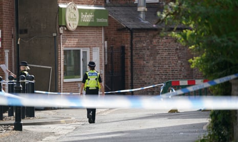 Police tape and officer in Boston, Lincolnshire