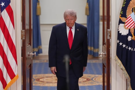 Donald Trump arrives to speak about the Iran war from the Cross Hall of the White House on 1 April 2026.