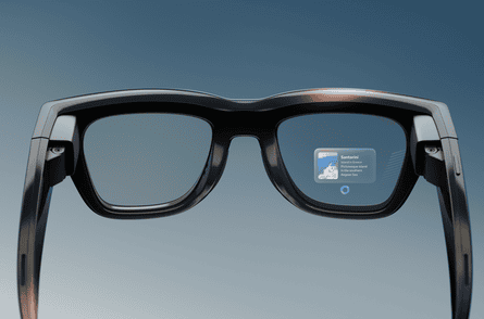 A pair of the glasses with a display projected on to the lower portion of the right lens