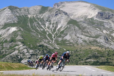 Ben Healy and others ride through the mountains on stage 18 of last year’s Tour.