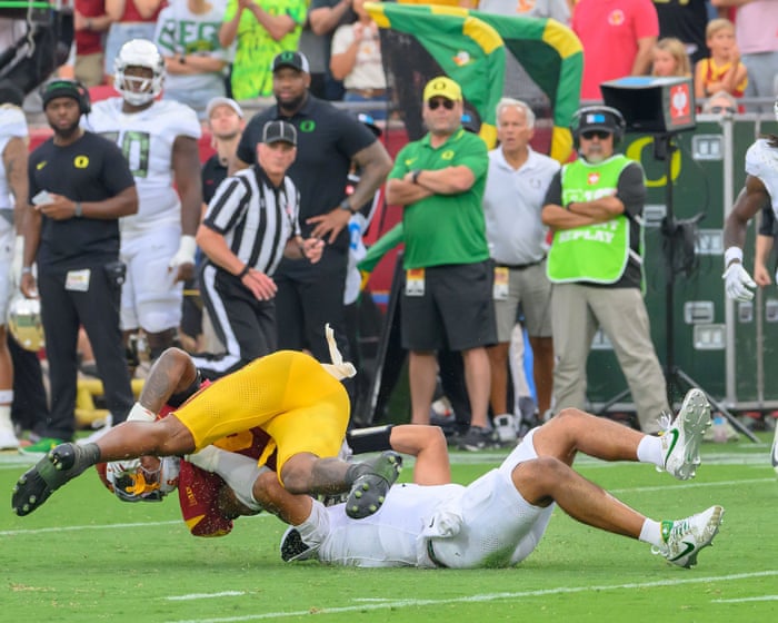 Lanning decries ‘disgusting’ late hit that sends Oregon QB Dante Moore to hospital