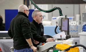 Workers on Novograf's factory floor in East Kilbride