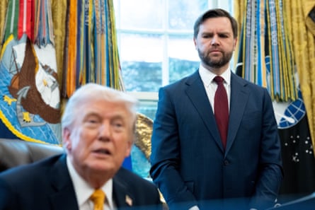 Men look at camera in Oval Office