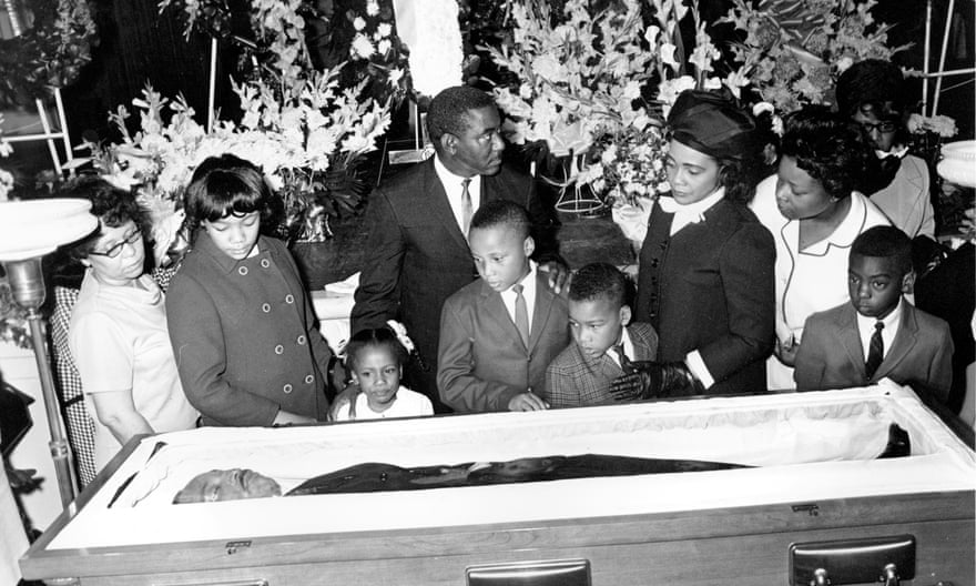 Coretta Scott King (fourth right) with her children – (from second left) Yolanda, 12, Bernice, five, Martin, 11, and Dexter, seven – at the casket of Martin Luther King Jr