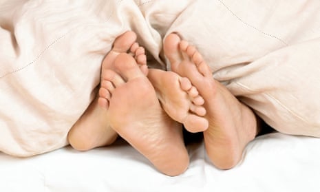 A couple lying in bed