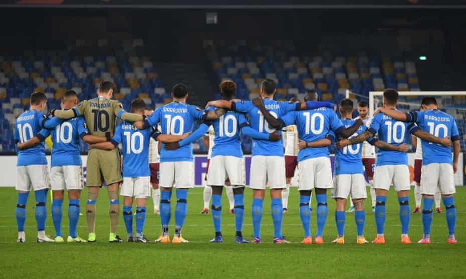 Napoli players observe a minute of silence prior to kick off in memory of Diego Maradona.