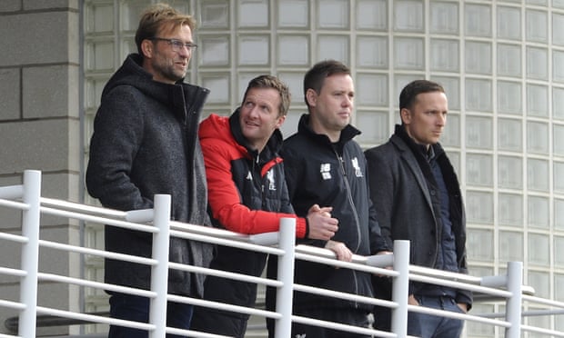 Michael Beale (second right) with Jurgen Klopp (left) the day after the German was unveiled as Liverpool manager in October 2015.