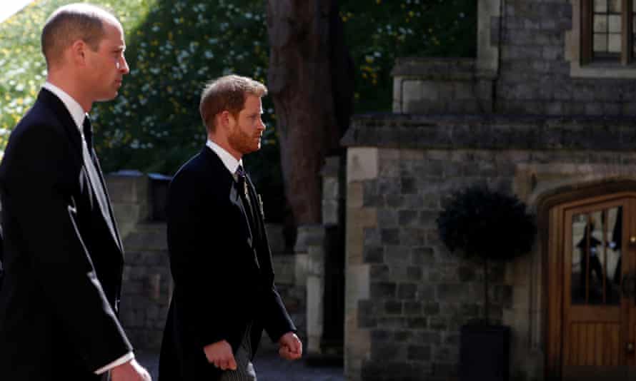 Prince William and Prince Harry follow the hearse, a specially modified Land Rover, towards St. George’s Chapel.