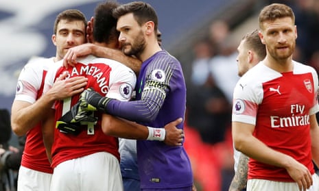 Tottenham’s Hugo Lloris embraces Arsenal’s Pierre-Emerick Aubameyang after the final whistle.