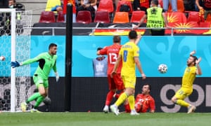 North Macedonia’s Goran Pandev (on ground) reacts after being fouled by Oleksandr Karavaev resulting in a penalty.