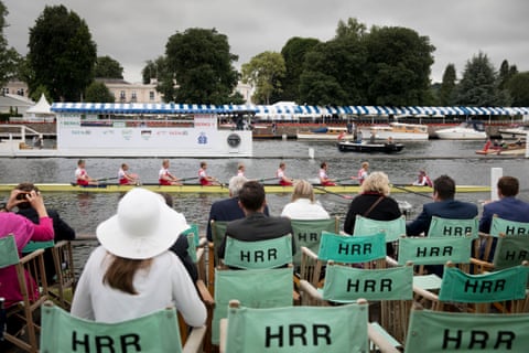 Specators watch the royal regatta inside the stewards enclosure at Henley-on-Thames