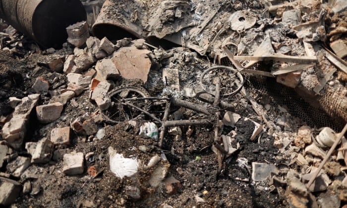 A bicycle near a house destroyed by a Russian missile strike in the city of Sloviansk