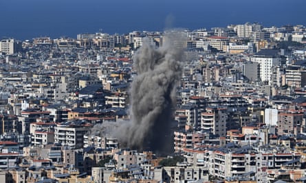 Smoke rises above residential buildings after an Israeli airstrike in the Dahieh suburb of south of Beirut, Lebanon