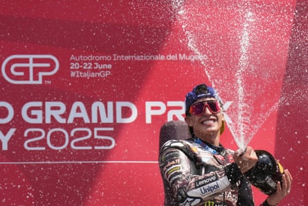Marc Márquez celebrates on the podium