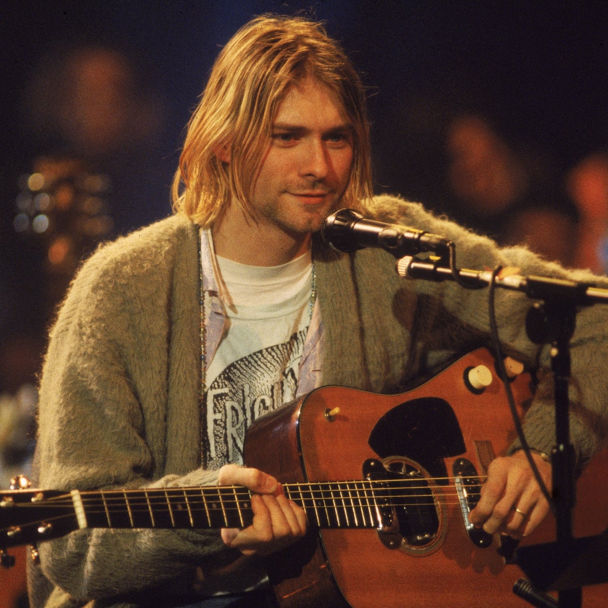 Kurt Cobain’s green cardigan raises record $334,000 at auction