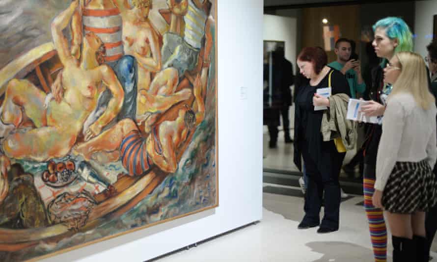 Visitor's look at a painting at Belgrade Museum of Contemporary Art.