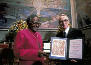 1984: Tutu poses with his Nobel peace prize along with the chairman of the Nobel committee, Egil Aarvik, in Oslo