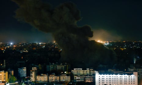 Smoke rises over Rafik Hariri International Airport after an Israeli airstrike on the Beirut suburb of Dahiyeh.