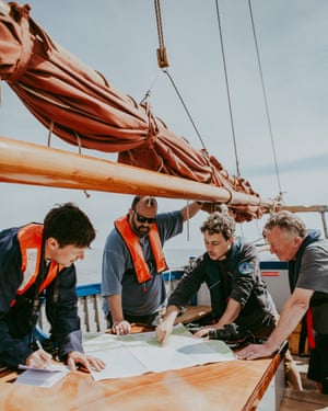 From left to right, Patrick Barkham, Charlie Hodson, skipper Dom and a crew member on board the Salford whelk boat off the north Norfolk coast.