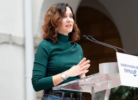 Isabel Diaz Ayuso speakers from a lectern
