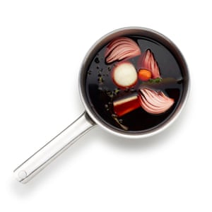 Start with the wine base by steeping onion, carrot, celery, garlic and herbs, and reducing by half.