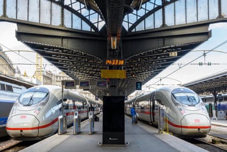 Two third generation ICE (class 407) high-speed trains from german company Deutsche Bahn stationing on a platform in Paris Gare de l'Est train station