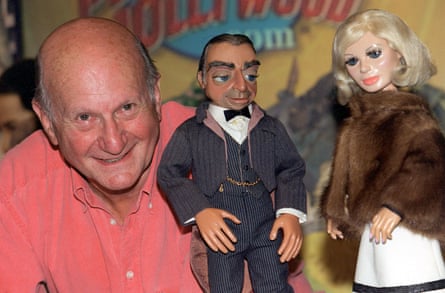 Gerry Anderson with two of his most famous puppets, Lady Penelope and Parker.