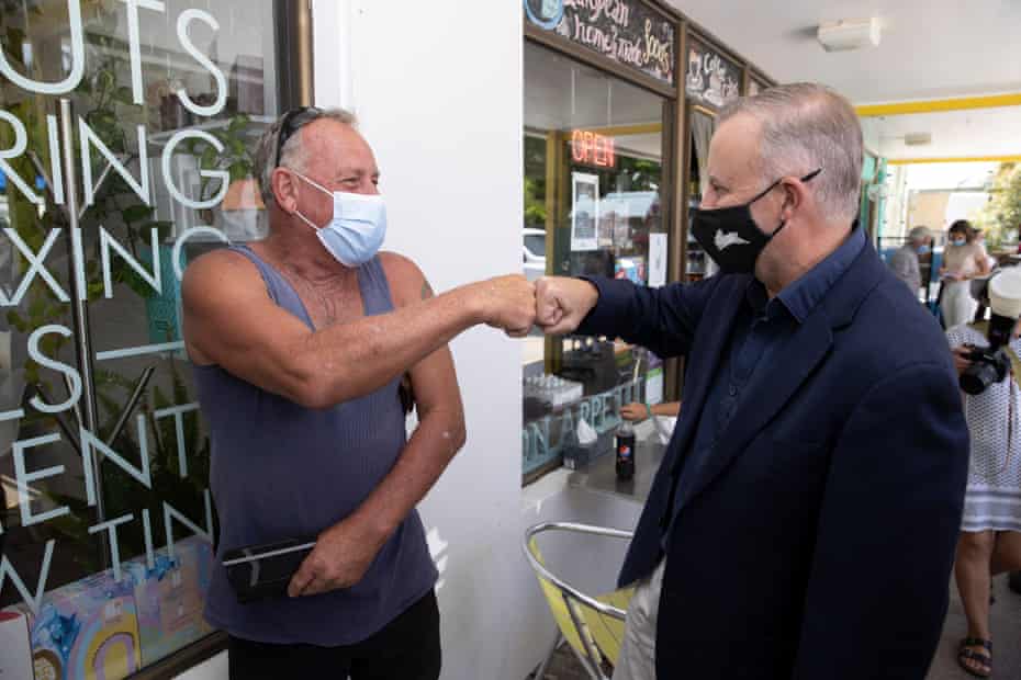Anthony Albanese meets fellow South Sydney fan John James in Mogo