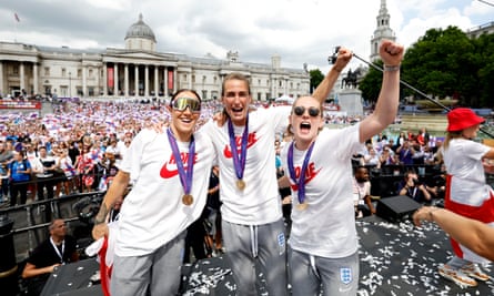 From left: Lucy Bronze, Jill Scott and Keira Walsh celebrate in Trafalgar Square