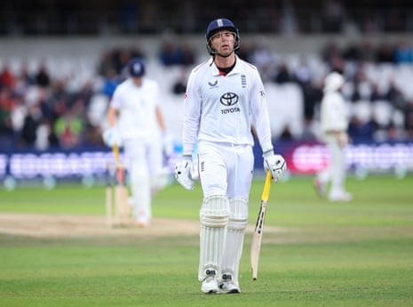 Dan Lawrence walks off after losing his wicket for 51.