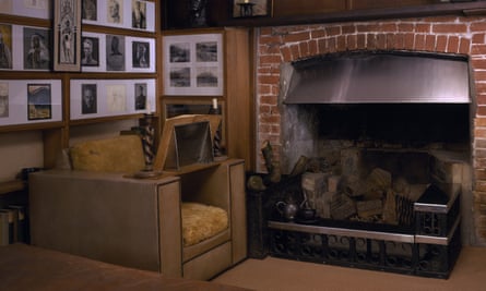 The book room at Clouds Hill, showing the reading chair and fireplace