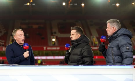Steve Cooper, possibly ranking Gary Neville and Jamie Carragher’s puffer jackets.
