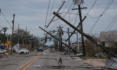 A street is seen strewn with debris and downed power lines after Hurricane Laura passed through the area on Thursday in Lake Charles, Louisiana.