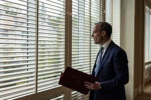 Dominic Raab gazes out of a window