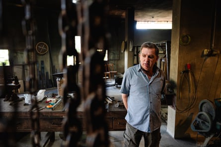 Naffah stands in his workshop.