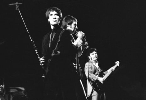 Wilko Johnson, left, playing with Dr Feelgood bandmates Lee Brilleaux and John Sparks.
