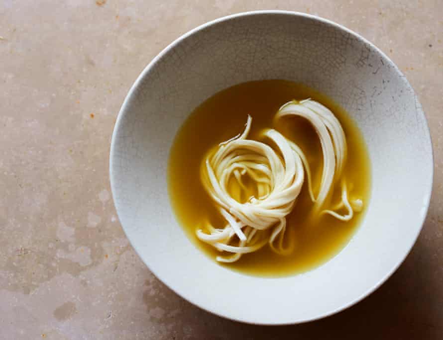 Golden turmeric and ginger udon noodle soup.