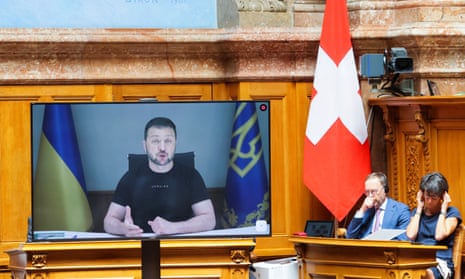 Volodymyr Zelenskiy addresses the parliament in a video message