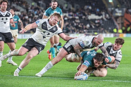Noah Stephens dives in to score a try to help put St Helens on their way to a 24-14 victory against Hull.