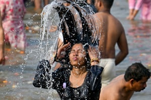 Prayagraj, IndiaA Hindu pilgrim takes a dip at Sangam, during the Kumbh Mela festival