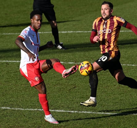 Liam Gordon (left) on the ball for Walsall.