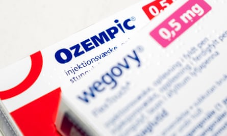 Packages of prescription drugs Ozempic and Wegovy by Novo Nordisk sit on a table in Copenhagen, Denmark, 23 March 2023.
