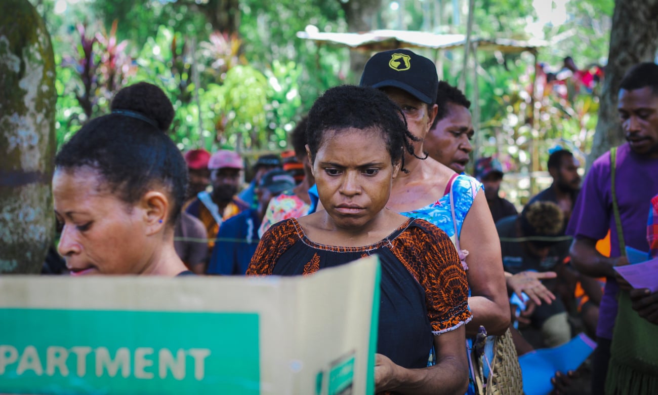 A woman queues to vote on the Rai coast in Madang, Papua New Guinea