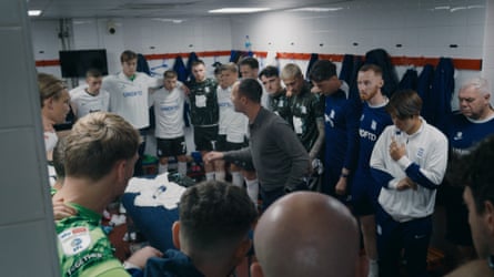 Birmingham City manager Chris Davies speaks to his players in the dressing room