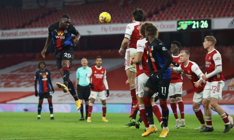 Crystal Palace’s Christian Benteke climbs to head on goal.